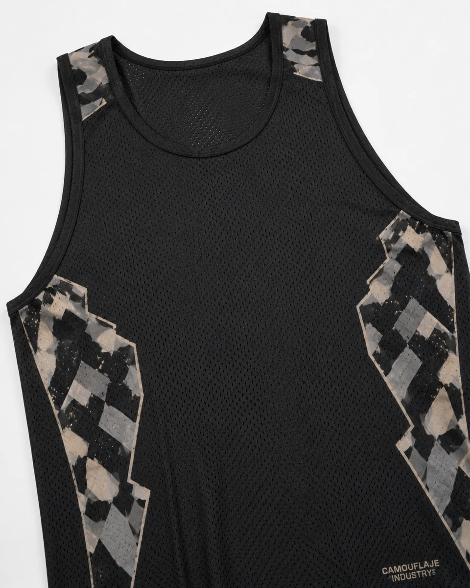 Close-up of breathable technical fabric used in custom athletic tank tops